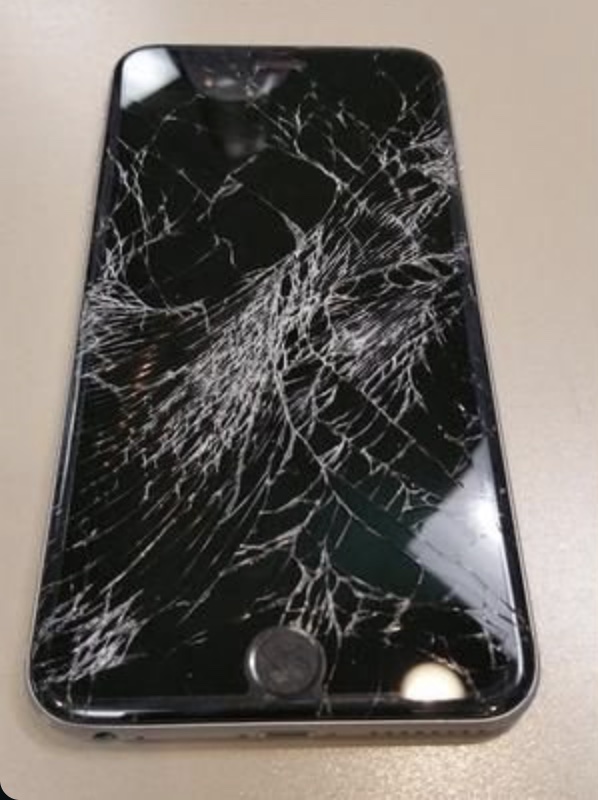 Before repair - cracked screen